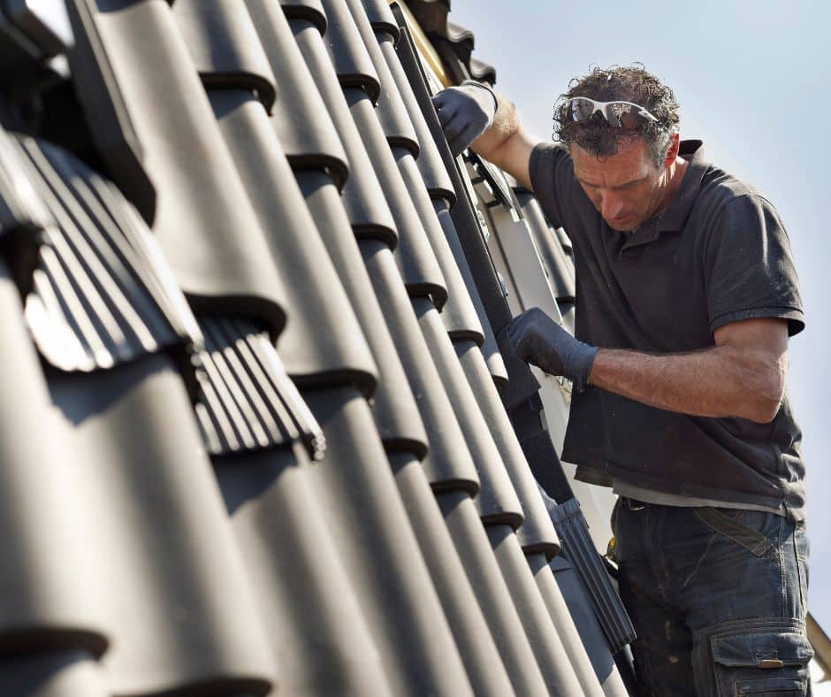 a man working on a roof