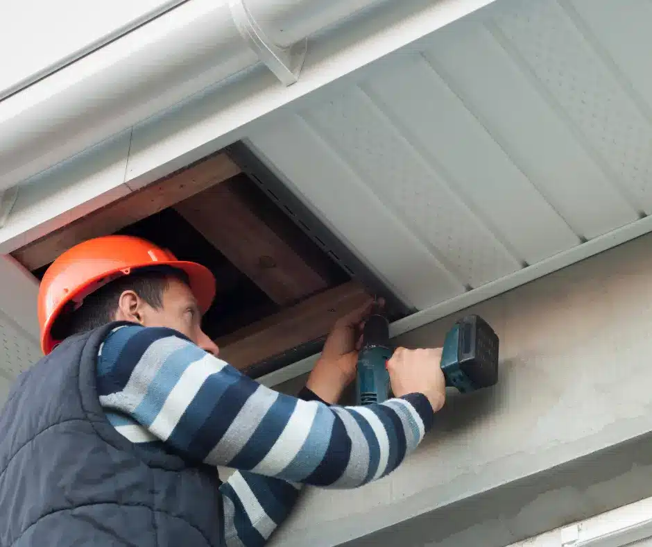 an expert roofer in winnipeg installing soffit and fascia