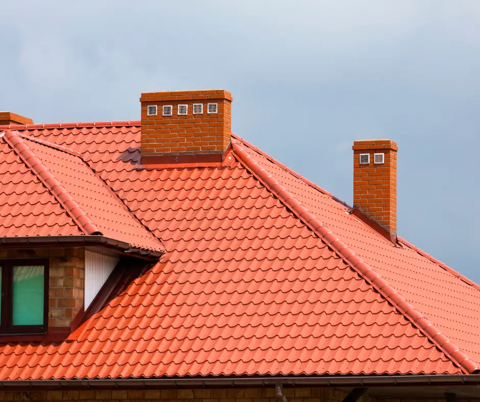 a newly replaced roof with chimneys