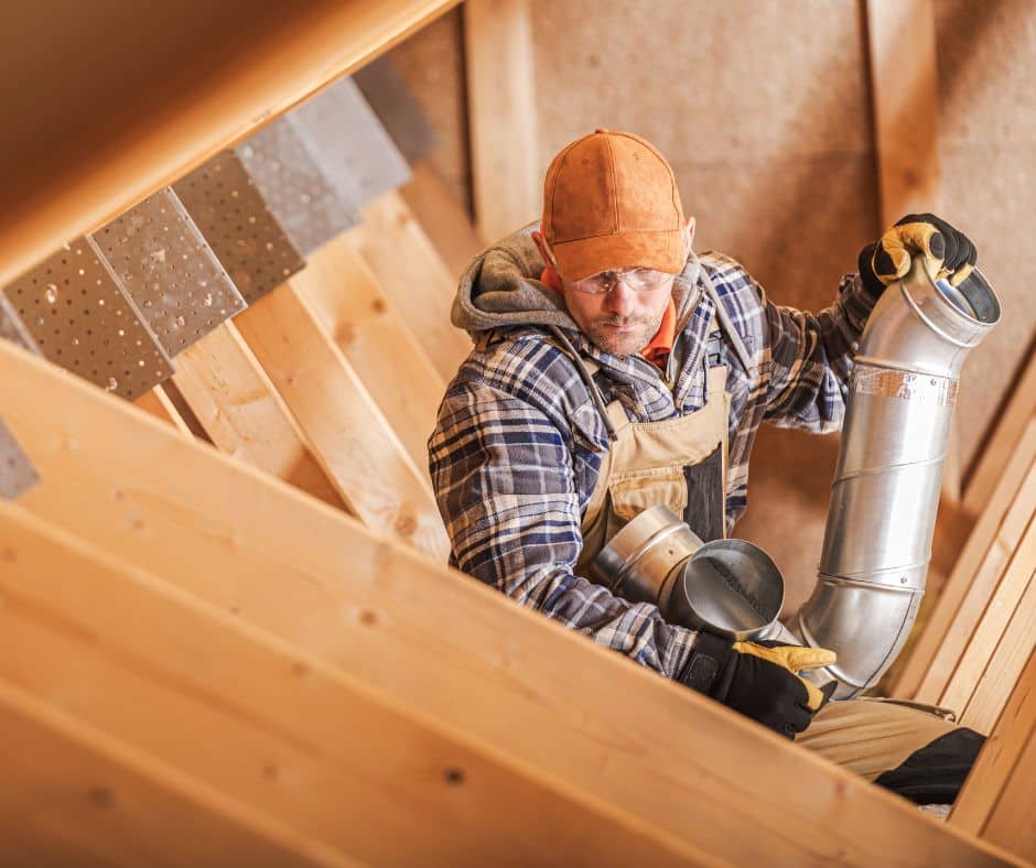 a roofer doing vacuum insulation