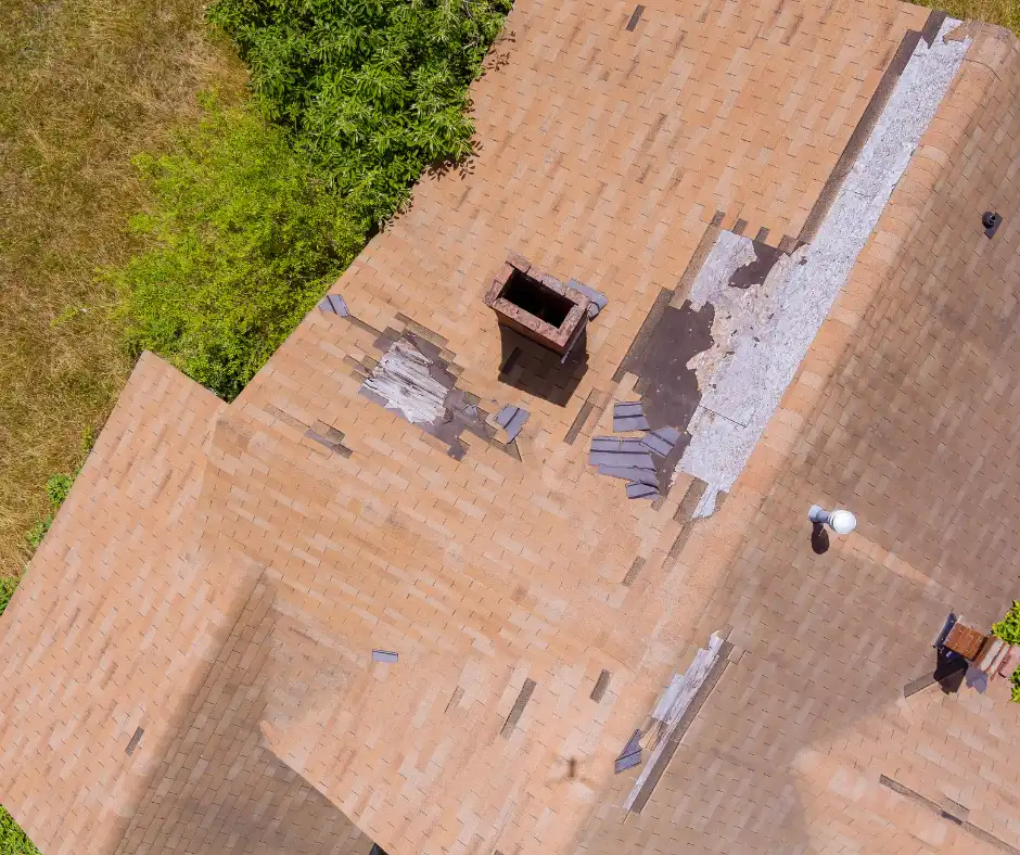 an aerial shot of an ongoing roof restoration