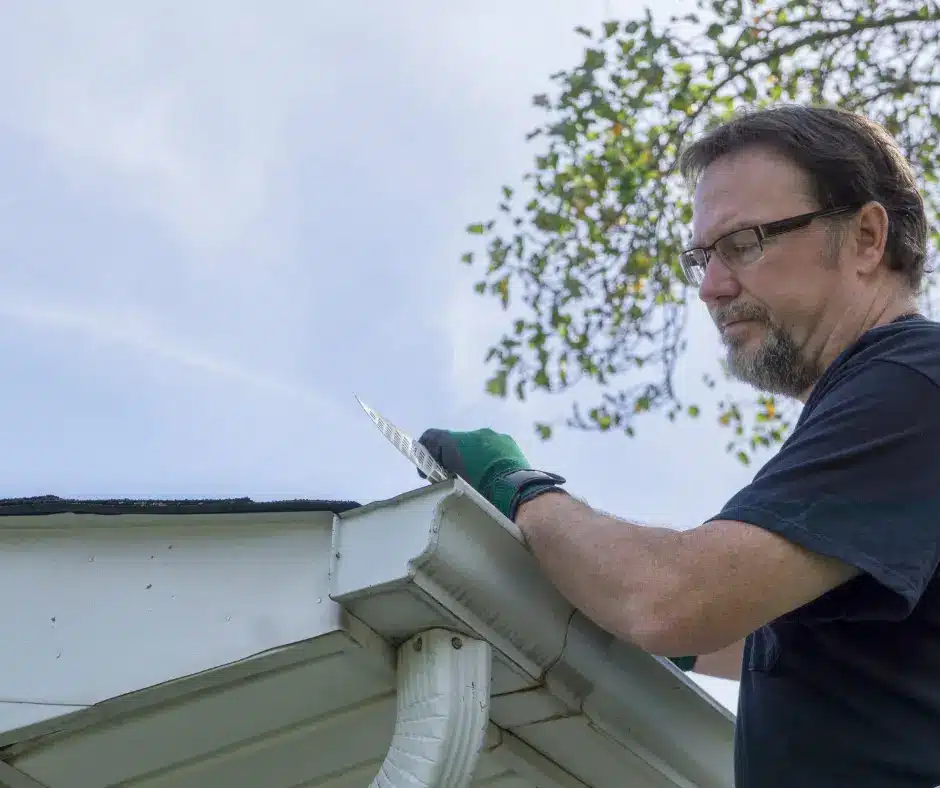 A winnipeg roofing expert installing a roof eave