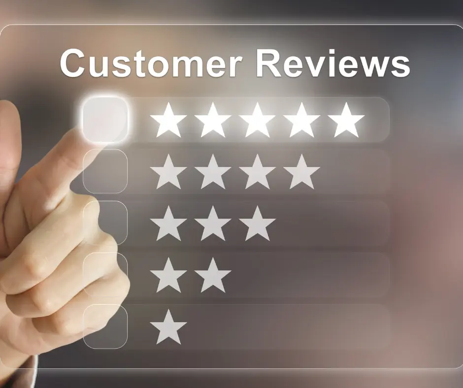 a hand pressing a button on a touch screen that says customer reviews