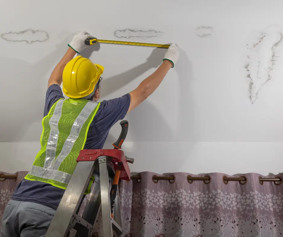 a man detecting roof as part of roof leak repair