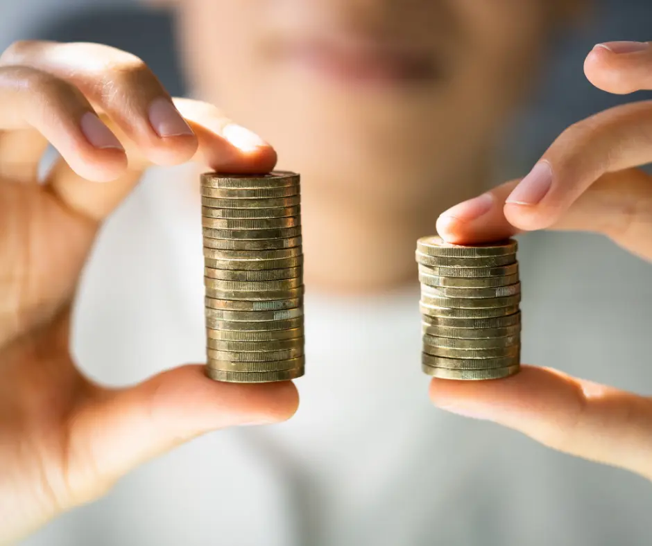 a person holding coins in their hands