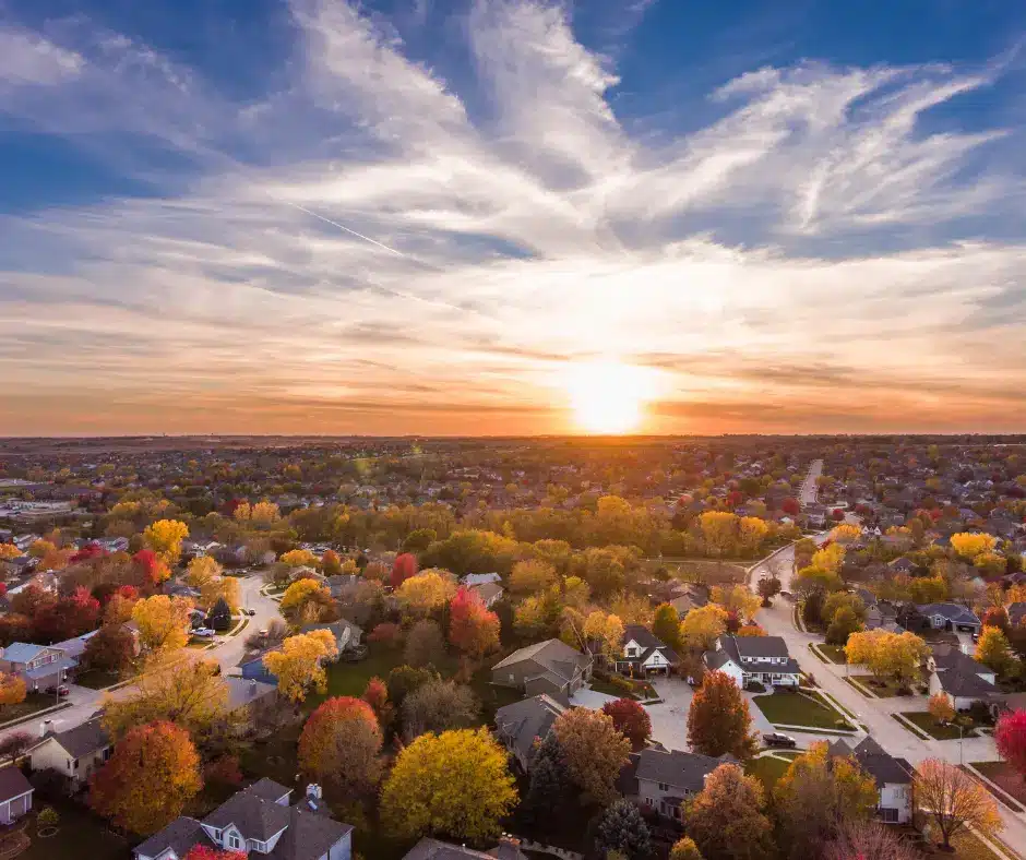 a sunset over a neighborhood