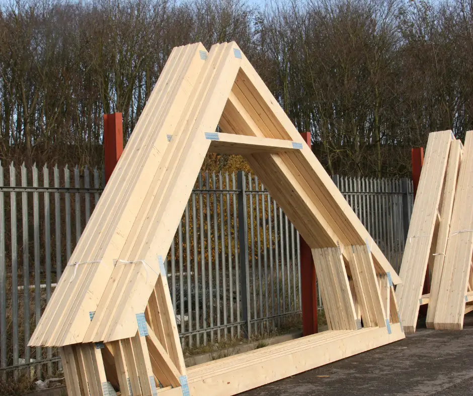 a group of wooden ROOF TRUSSES