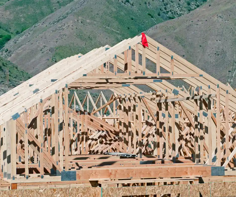 a wooden frame of a house under construction