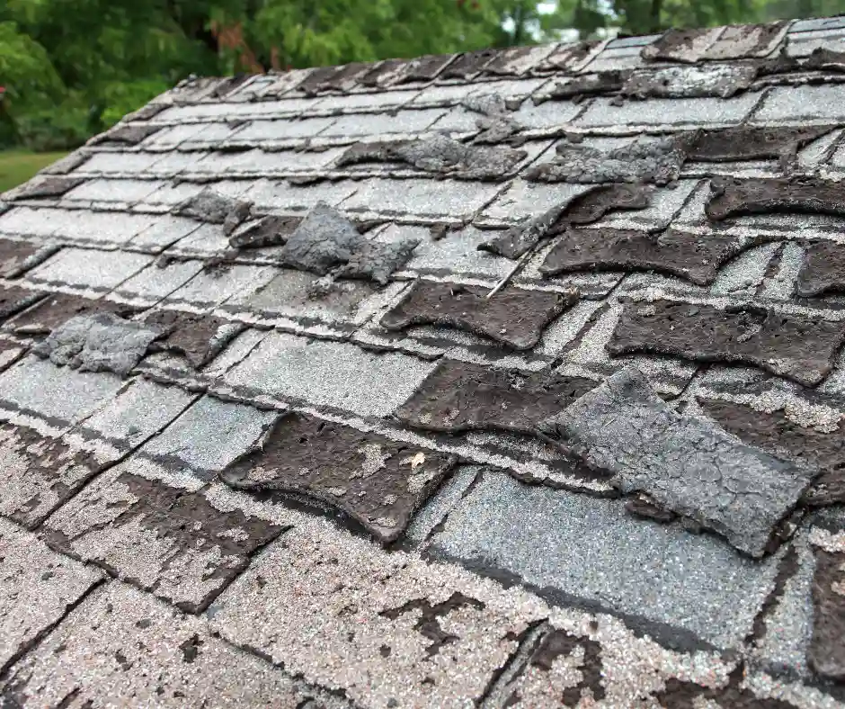 a roof with old shingles on it 