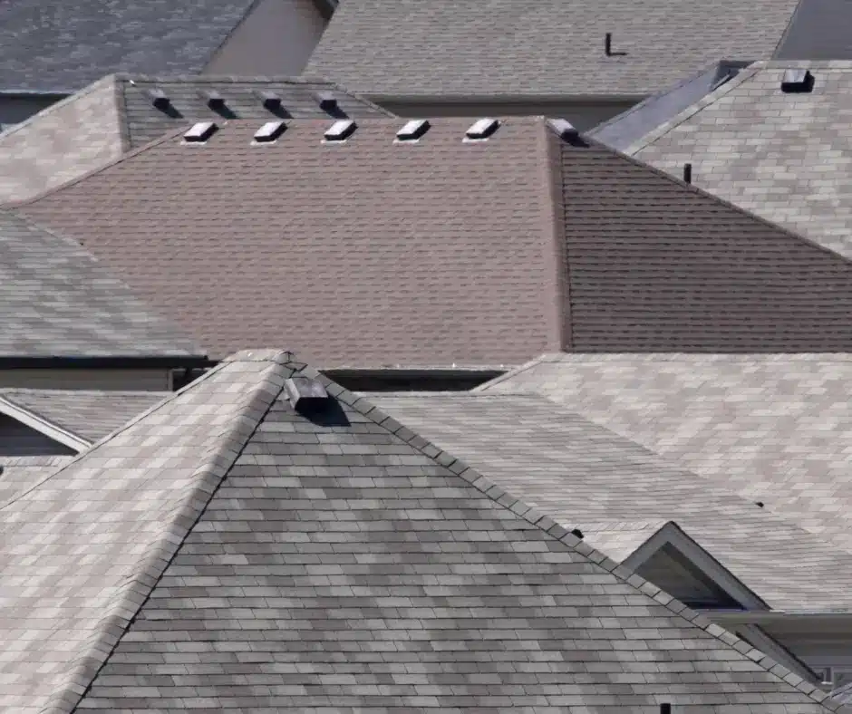 a group of rooftops with a few windows