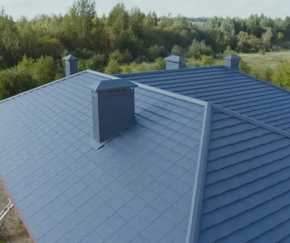 a roof of a house with trees in the background