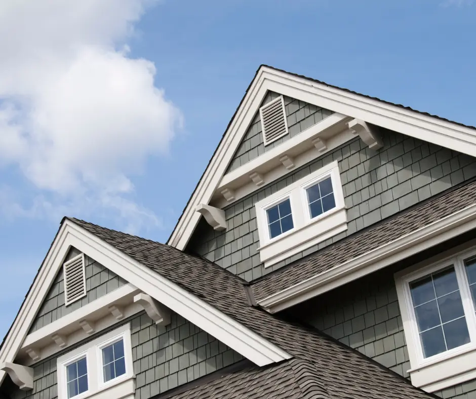 a house with a roof and windows