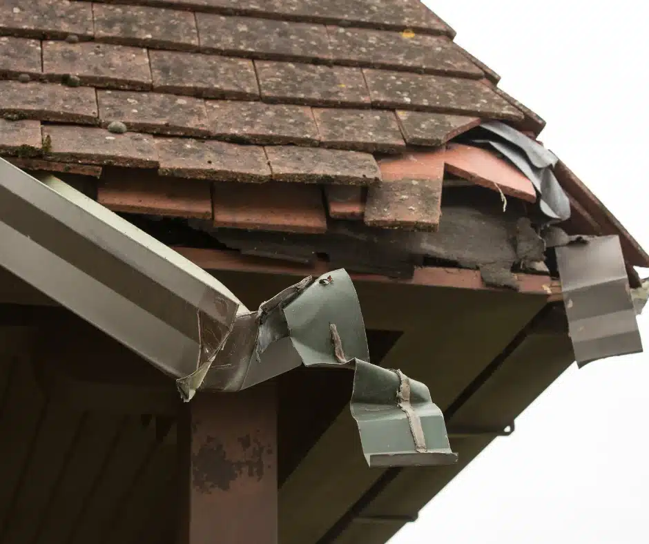 a roof with broken gutter