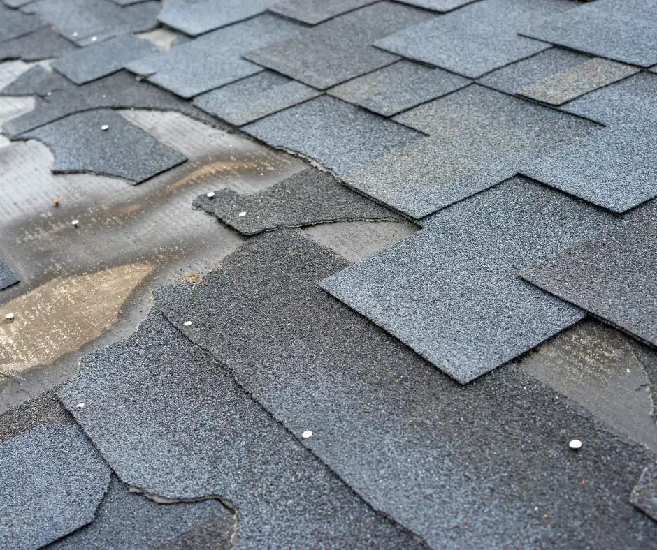 a roof with missing shingles