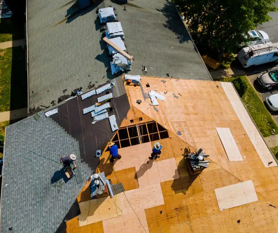 a group of people in Winnipeg installing a quality roof