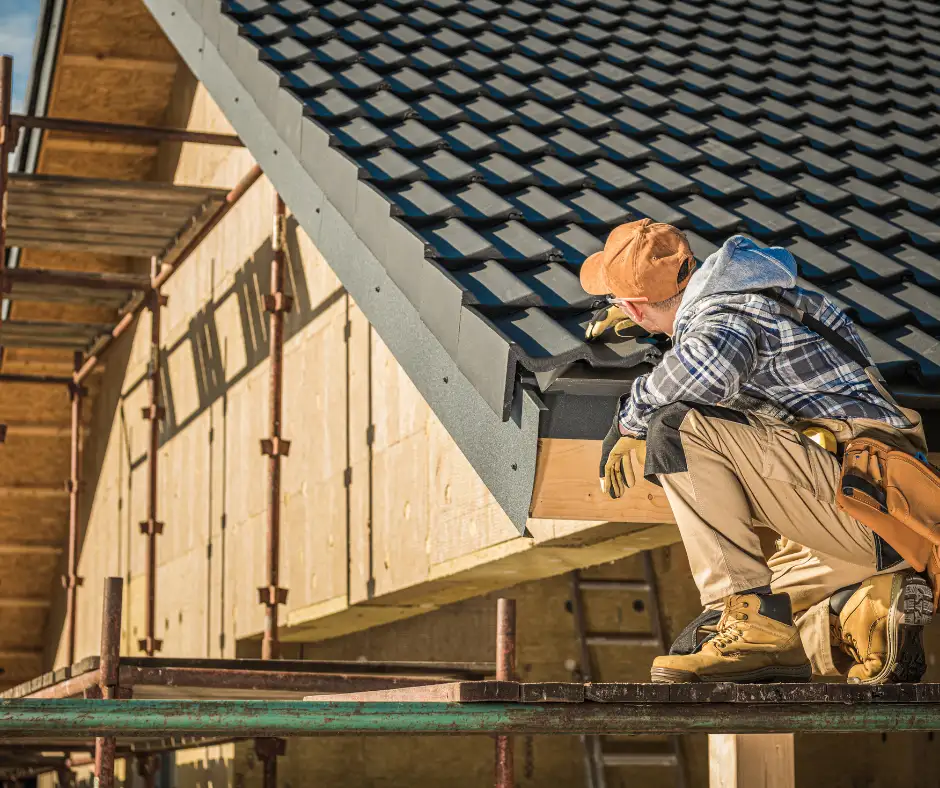 a roofer working on a roof